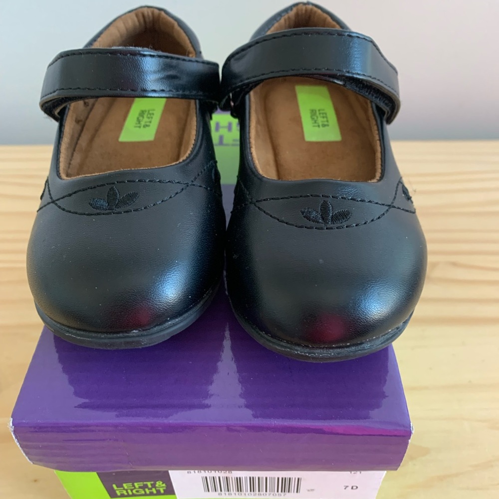 Left & Right black dress shoes with Velcro strap. Size 7.